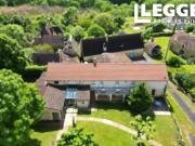 Maison en pierre avec 6 B&B's en plein centre...