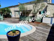 Maison en pierre avec piscine, dépendances et terrain...