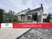 Maison en pierre avec véranda, garage, terrasse et jardin