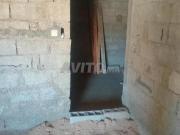 Maison en rez de chaussée, en cours de construction