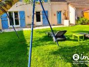 Maison familiale spacieuse avec garage et jardin