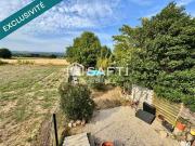 Maison mitoyenne avec terrain, terrasses et garage