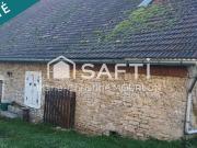 Maison mitoyenne en pierre au coeur du village de Alaise