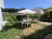 Maison traversante avec jardin