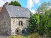 Maisonnette à rénover avec cave, terrasse et jardin