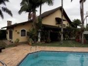 CASA DE ALTO PADRÃO COM ÁREA DE 609,95 M² NO CONDOMÍNIO...