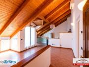 Mansarda arredata con terrazzo Milano