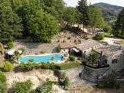 Mas de caractère en pierre avec piscine entouré de 14...