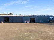 Massive high clearance building