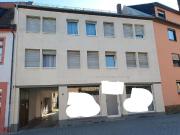 Mehrfamilenhaus mit Ladengeschäft und Hinterhaus,...