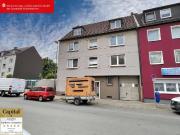 MEHRFAMILIENAUS MIT EINER GEWERBEEINHEIT IM INNENHOF IN...