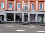 Mehrfamilienhaus + Ladenlokal in top Lage!