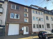 Mehrfamilienhaus mit Büroeinheit und Halle