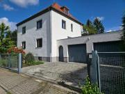 Mehrfamilienhaus mit Gartenidylle und Pool