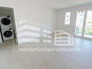 Mehrfamilienhaus mit Nebengebäude