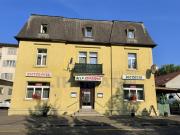 Mehrfamilienhaus mit Restaurant