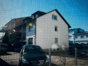 Mehrfamilienhaus mit Werkstatt mitten in Freiburg