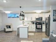 MODERN 2 BED, 1 BATH BASEMENT SUITE...
