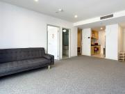 Modern 2 Bedroom, 1 Bathroom Apartment in Prime CBD Location