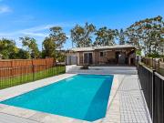 Modern 3 Bedroom Home with Pool Utilities Included!