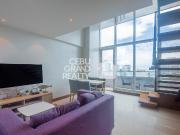 Modern and Sunlit Loft Condo with a Private Balcony