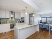 Modern Apartment with River and Foreshore Views