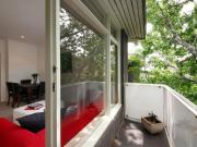 Modern Apartment with Tree Top Views