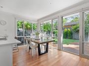 Modern beauty in tree lined street!