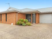 Modern brick unit situated to the rear of it’s complex of 4