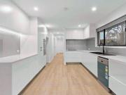 Modern Coastal Duplex with Canal Views – Walk to the Beach!