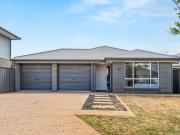 Modern Comfort and Versatility in a Family Friendly Setting