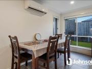 Modern family home with two living areas and air...