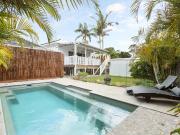 Modern family oasis designed for summer living