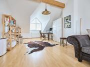 Modern furnished bright top floor apartment in top...