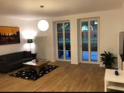 Modern ground floor apartment with private terrace