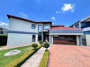 modern home with expansive glass wal.