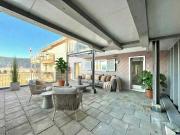 Modern home with large terrace and unobstructed view of...