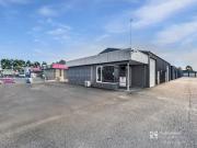 MODERN INDUSTRIAL WAREHOUSE LEASED TO NATIONAL BUILDING...