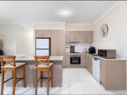 Modern Lakeside Living – Walk to Shops, Schools & the Lake!