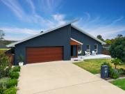 Modern Living with Beautiful Gardens and Sweeping Hill Views