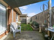 MODERN LOW MAINTEMANCE BRICK TOWN HOUSE IN QUIET SETTING