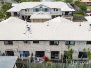 Modern & Low Maintenance Investment In A Prime Location!