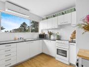 Modern one bedroom unit with use of rooftop terrace!