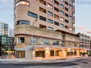 Modern split level apartment with luxe finishes in a...