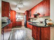 modern three bedroom home with pool.