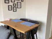 Modern top floor apartment in a quiet side street within...