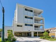 Modern Top Floor Apartment in Boutique Cotton Tree Complex