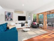 Modern Townhouse Sanctuary in Prime Locale!