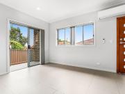 Modern Two Bedroom Home North Facing Courtyard!