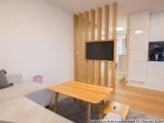 Modern und angenehm möbliert im Neubau mit Balkon & TG...